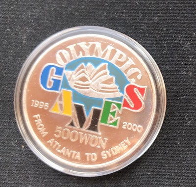 币观天下~第四十九期 - 【朝鲜】1996年发行2000年悉尼奥运会彩色纪念银币