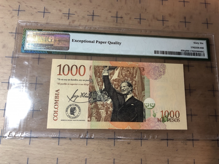 收藏联盟第七十期拍卖 哥伦比亚141000 PMG66E