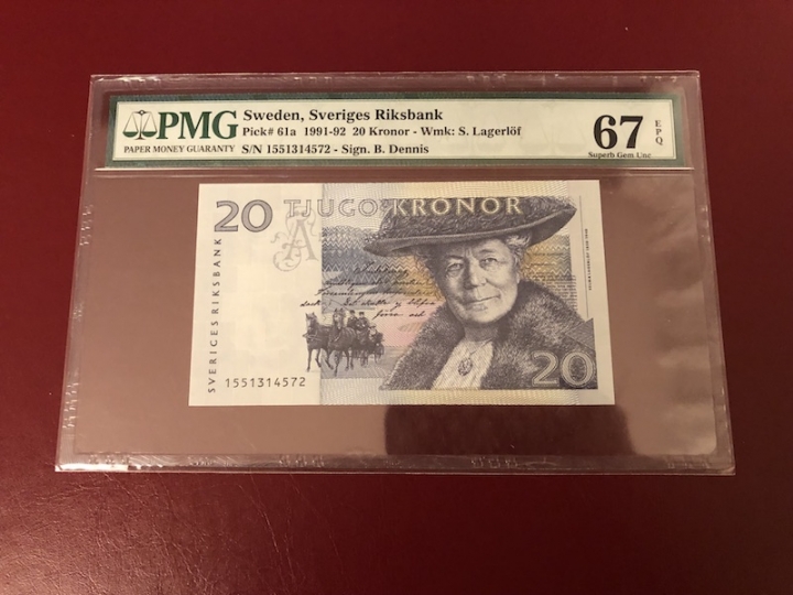 收藏联盟第七十一期拍卖 瑞典初版骑鹅 PMG67E