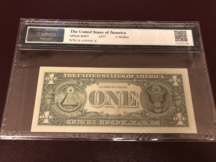 收藏联盟第七十二期拍卖 美国1977年1元 NPGS评级63E 6同5恐龙号