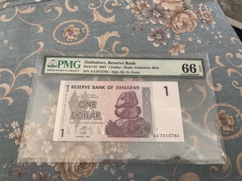 收藏联盟第七十三期拍卖 津巴布韦071 PMG66E