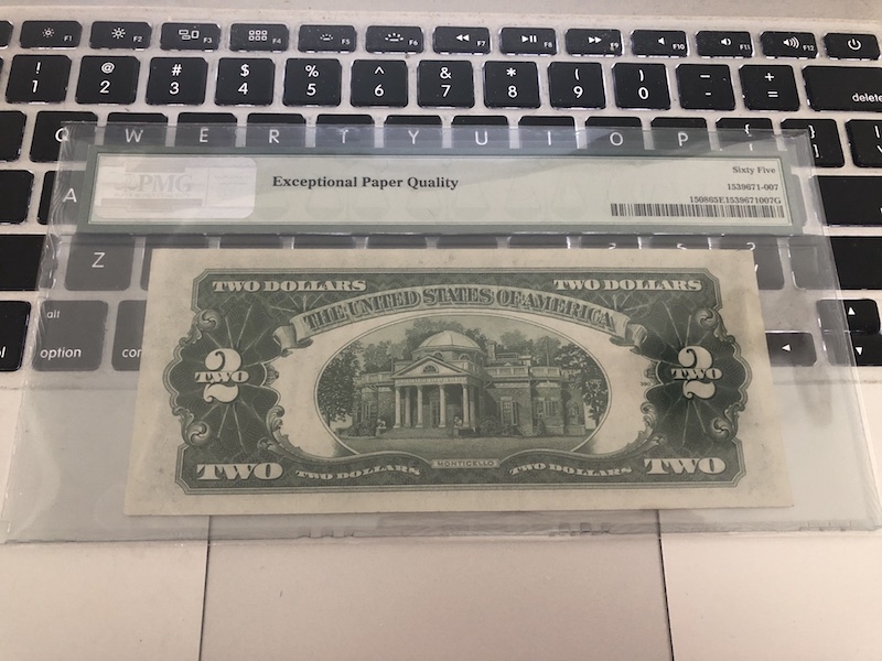 收藏联盟第七十三期拍卖 美国红库印282 PMG65E