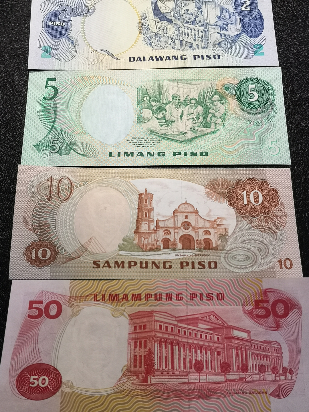 《外钞收藏家》第六十二期拍卖目录 菲律宾2、5、10、50四张 全新unc