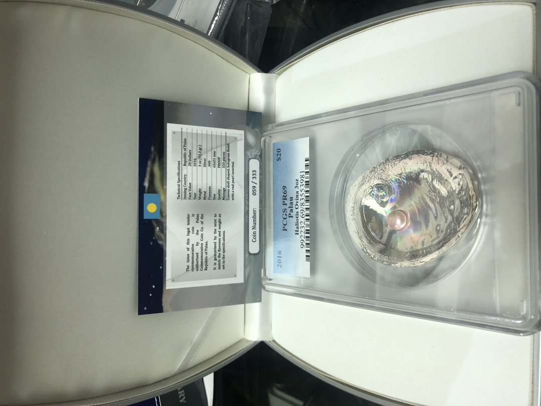 【随心拍】现代金银币拍卖第八期 PCGS PR69分  2016年帕劳羊耳鲍珍珠镶嵌精制获奖银币.3盎司