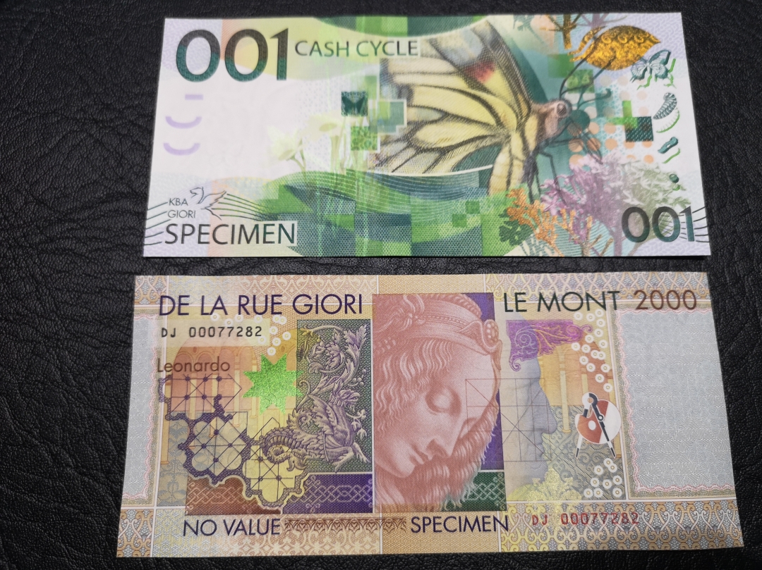 《外钞收藏家》第六十四期拍卖 经典测试钞两张  全新unc