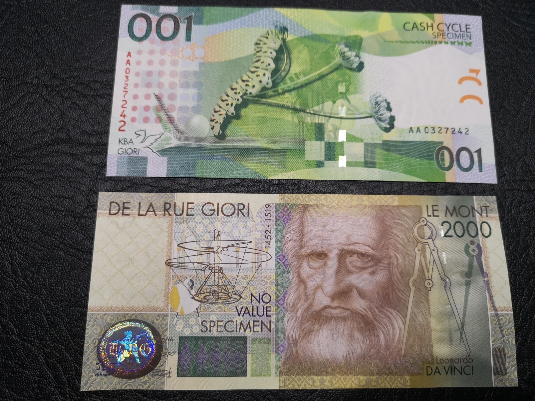 《外钞收藏家》第六十四期拍卖 经典测试钞两张  全新unc