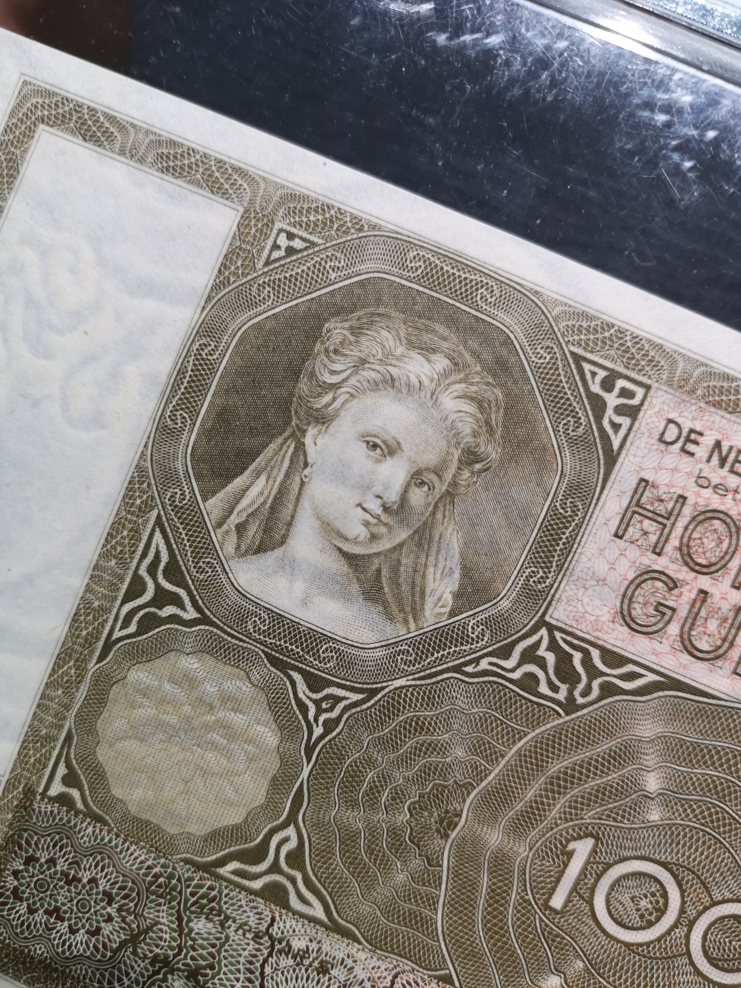 《外钞收藏家》第六十四期拍卖 荷兰1944年100盾 大票 精美雕刻小女孩 pmg66