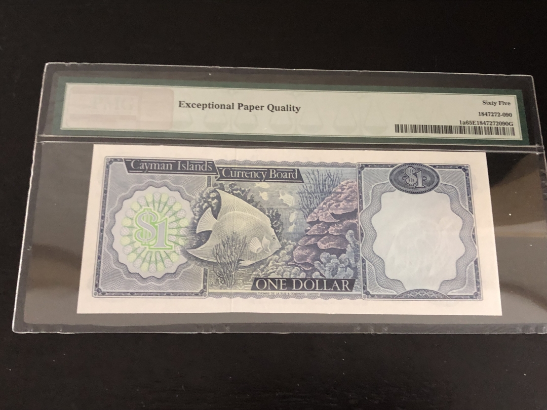 收藏联盟第八十一期拍卖 开曼群岛1971年1元 PMG65E S/N:A/1 412069
