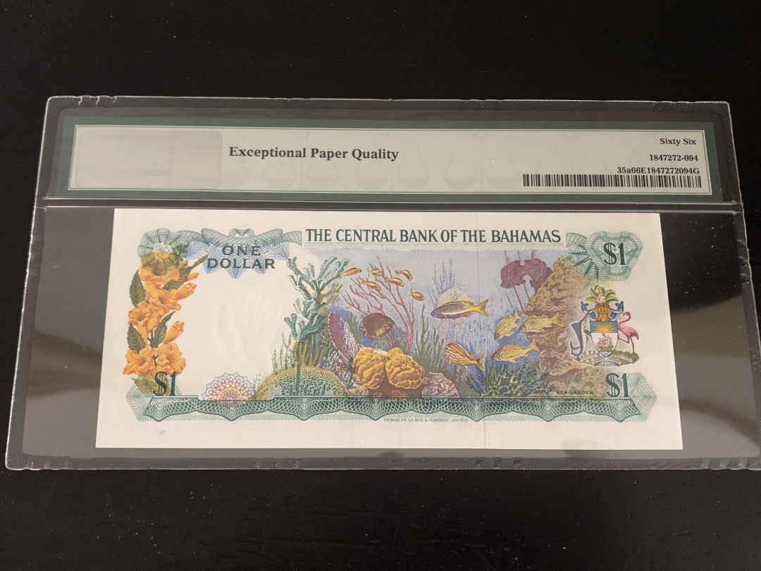 收藏联盟第八十一期拍卖 巴哈马74年1元35a 彩背版 PMG66E S/N:J/1 624434