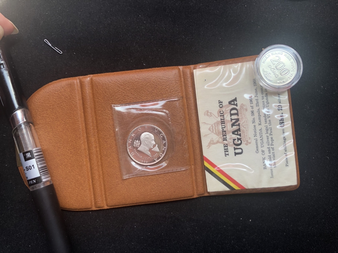 【币观天下】第六十二期拍卖 【乌干达】1969年教皇访问非洲2先令钱币【小钱包】