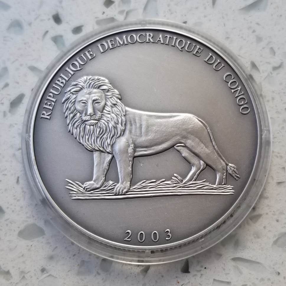 【币观天下】第六十三期拍卖 【刚果】2003年摔跤一盎司凹面仿古银币