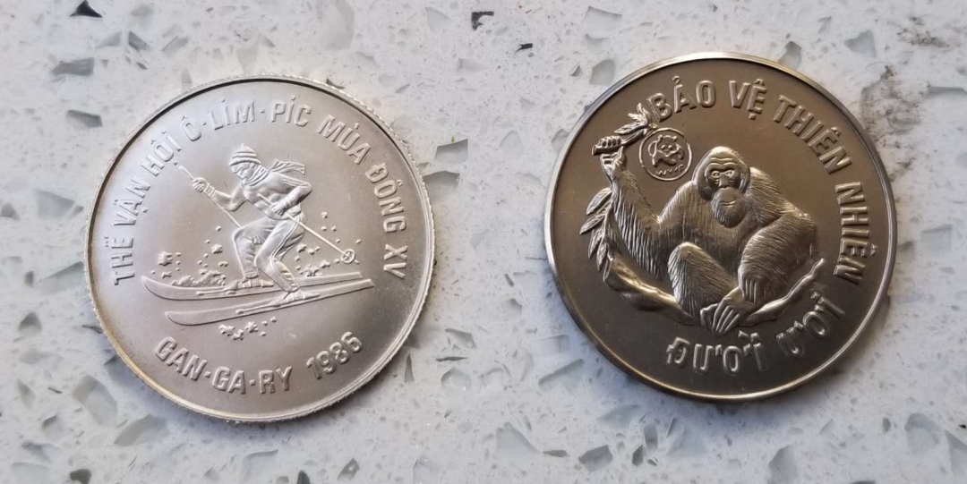 【币观天下】第六十三期拍卖 【越南】1986年冬奥会银币和1987年WWF大猩猩镍币一组两枚