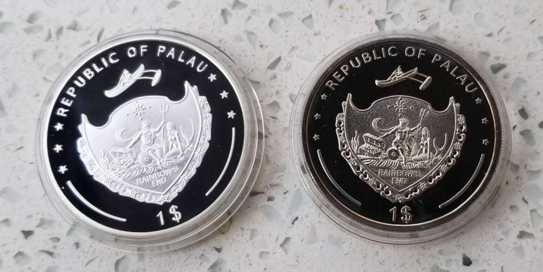 【币观天下】第六十四期拍卖 【帕劳】2011年海洋鱼类彩色镍币1枚和2014年MMA亚太冠军刘文擘彩色镍币1枚。