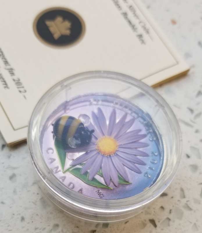 【币观天下】第六十四期拍卖 【加拿大】2012年蜜蜂鲜花立体镶嵌银币