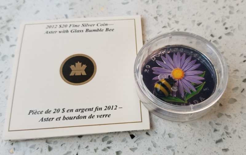 【币观天下】第六十四期拍卖 【加拿大】2012年蜜蜂鲜花立体镶嵌银币