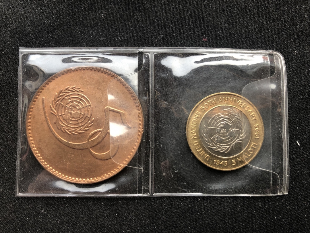 【币观天下】第六十四期拍卖 巴基斯坦联合国50周年+莱索托双色纪念币