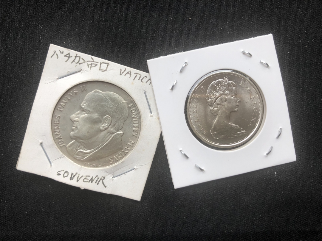 【币观天下】第六十五期拍卖 【梵蒂冈+加拿大】梵蒂冈圣母怜子章+加拿大狼银币
