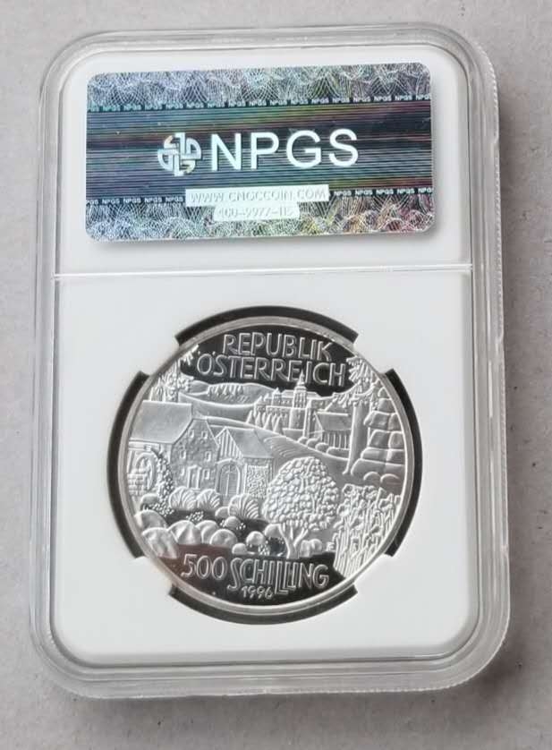 【币观天下第六十六期拍卖】 【奥地利】1996年轧麻夫妇500先令精制银币，众诚评级封装。
