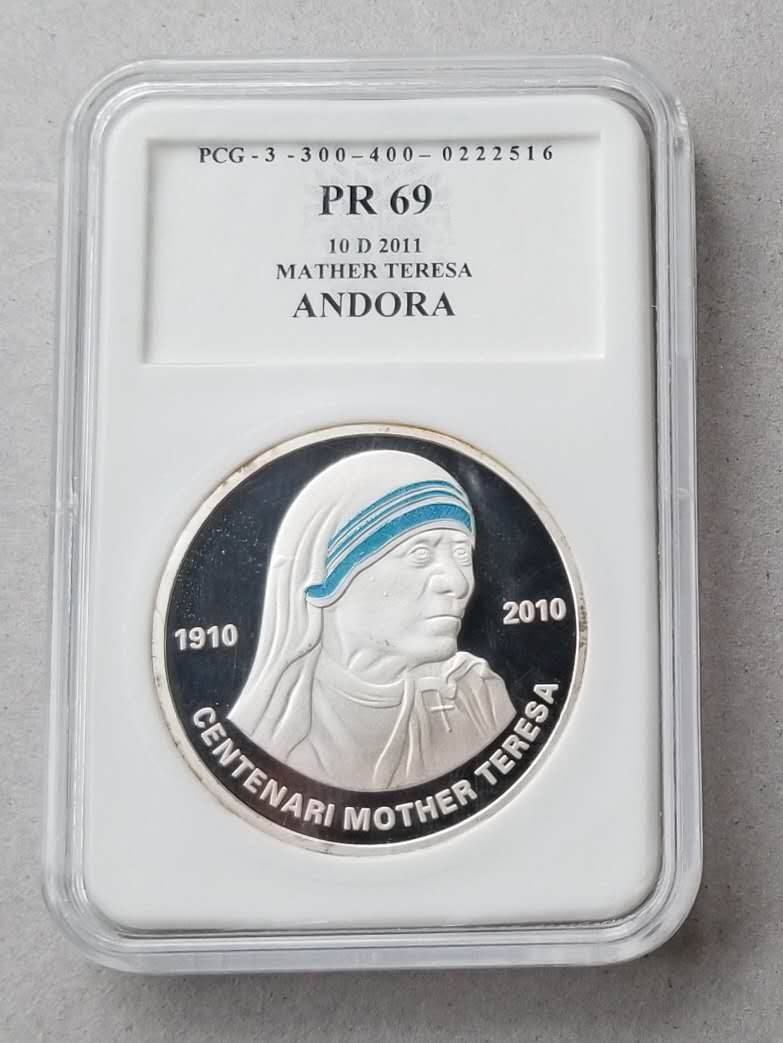 【币观天下第六十六期拍卖】 【安道尔】2011年特蕾莎修女彩色1盎司银币，波兰PCG封装。