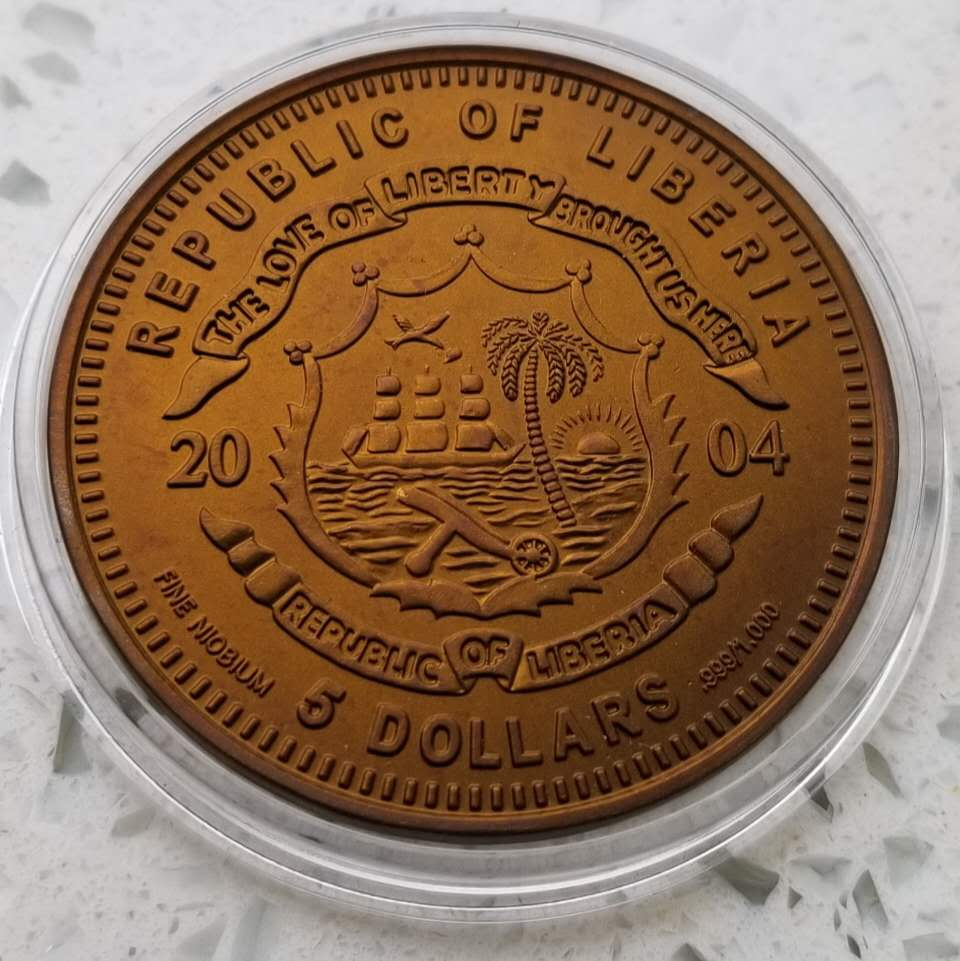 【币观天下】第六十七期拍卖 【利比里亚】2004年奥运彩色铌币一枚。