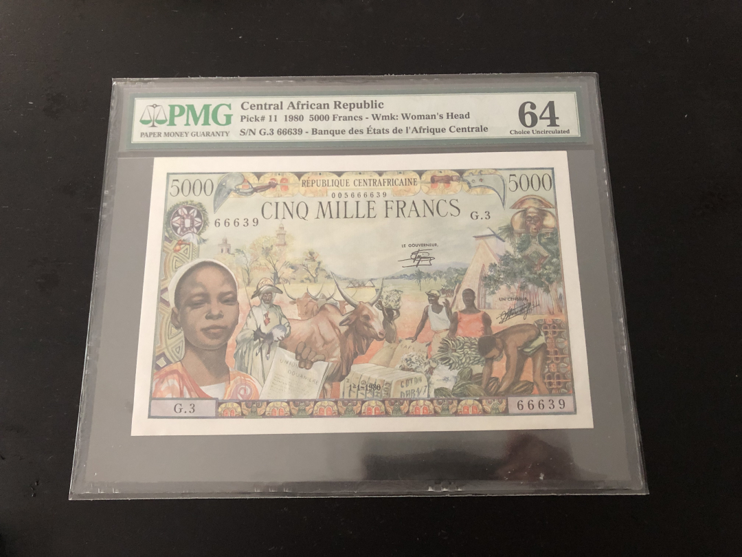 收藏联盟第八十六期暨CICE北京展销会专场拍卖 中非共和国1980年5000法郎 大烟斗 PMG64 大票幅精品 S/N:G.3 66639
