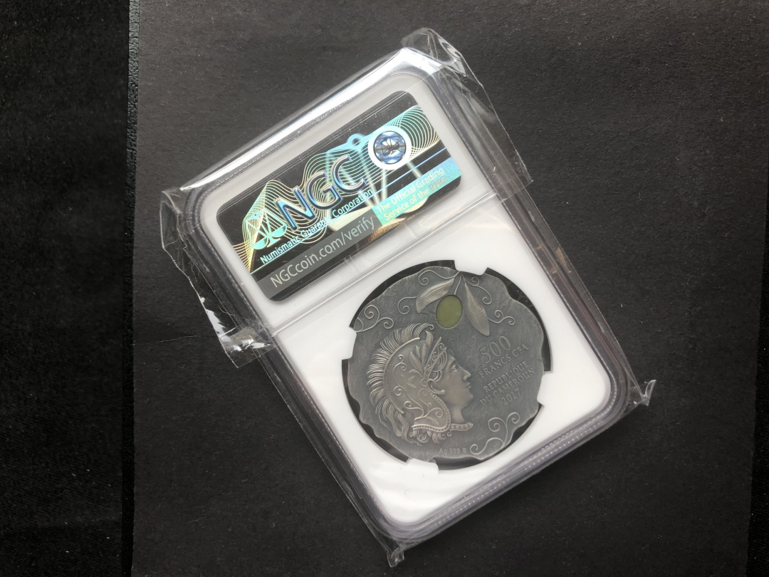 【币观天下】第六十九场拍卖 【喀麦隆】仿古镶嵌猫头鹰银币【ngc69】