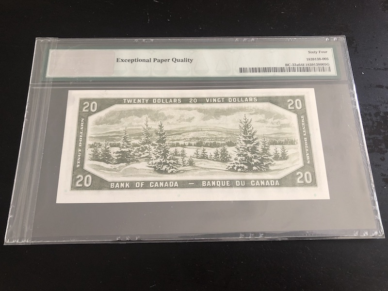 收藏联盟八十七期（国际儿童节为下一代珍藏）拍卖：） 1954年加拿大20加元鬼脸版 PMG64E S/N: B/E 1750830