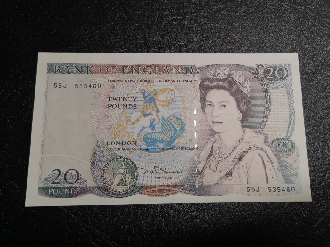 《外钞收藏家》第六十九期拍卖 英国D序列20镑 精美大票 unc 轻微压痕 