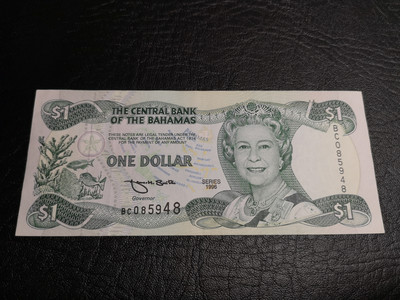 《外钞收藏家》第六十九期拍卖 - 巴哈马女王1元和英镑C序列10先令 VF品相两张