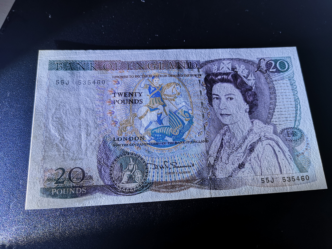 《外钞收藏家》第六十九期拍卖 英国D序列20镑 精美大票 unc 轻微压痕 