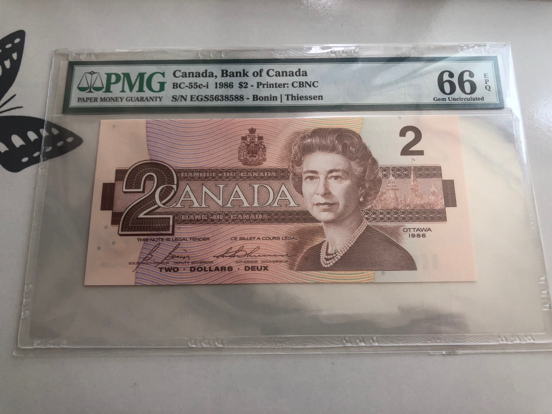 收藏联盟第八十八期拍卖 1986年加拿大2元 PMG66E 无47双尾88
