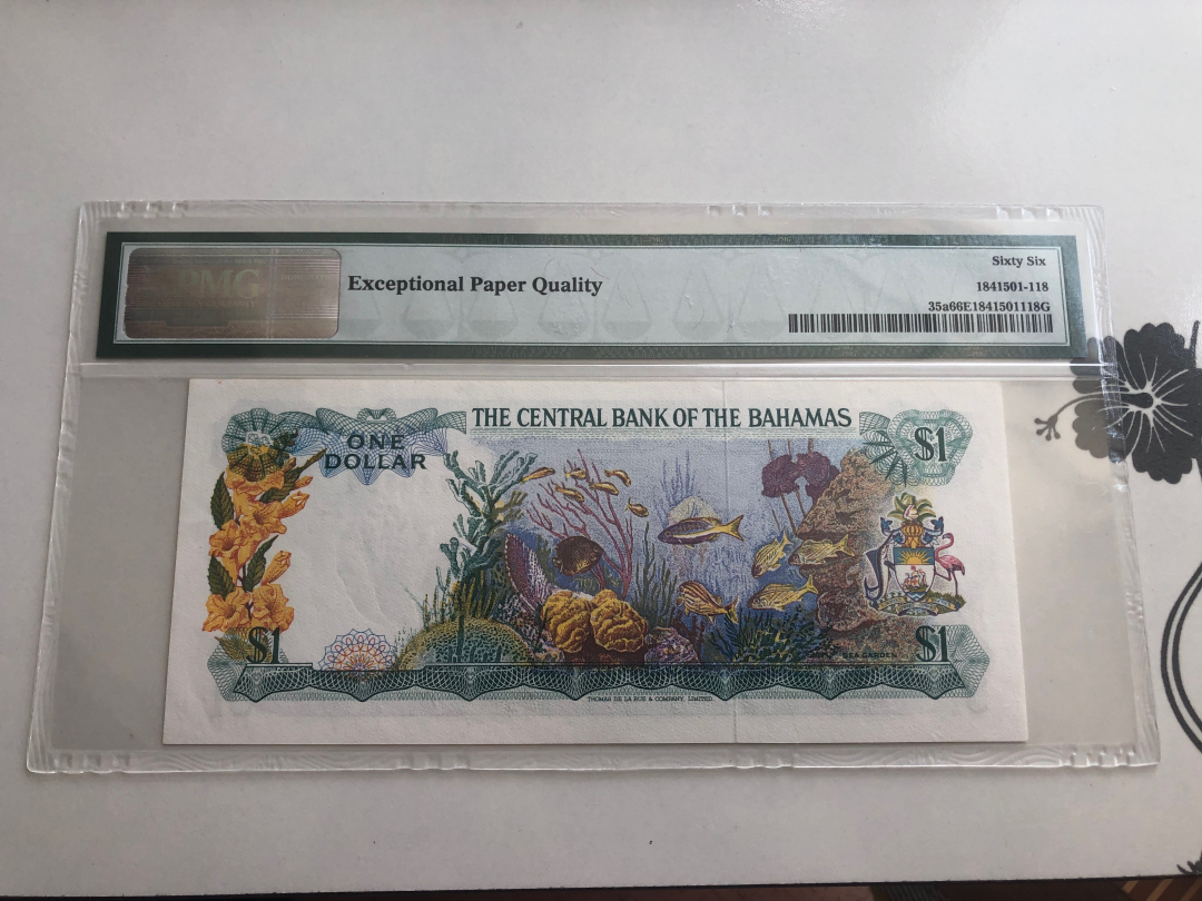 收藏联盟第八十八期拍卖 1974年巴哈马1元彩背版 PMG66E