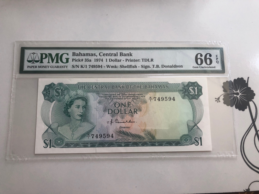 收藏联盟第八十八期拍卖 1974年巴哈马1元彩背版 PMG66E