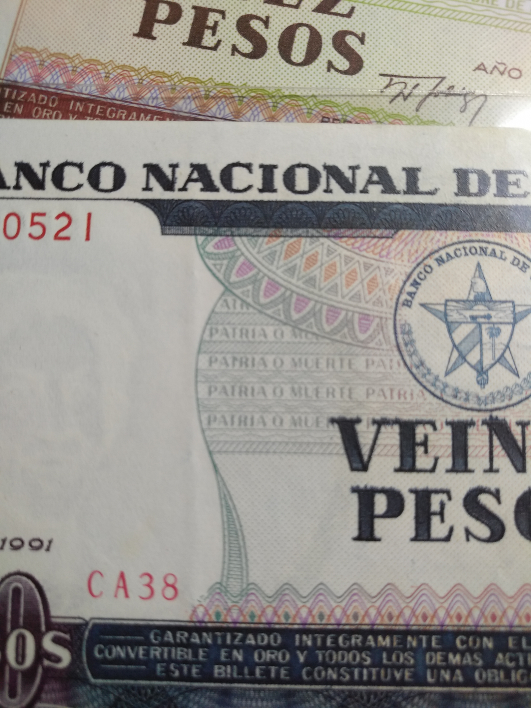 【鲸贝乐淘】千字文·第余号拍卖·上海钱币博览会专场 【中国代印】1990-1991年古巴10-50比索，AUNC ，10.20有小折痕，50比索有黄斑，50比索为错版，人名字母N上满未加~图标