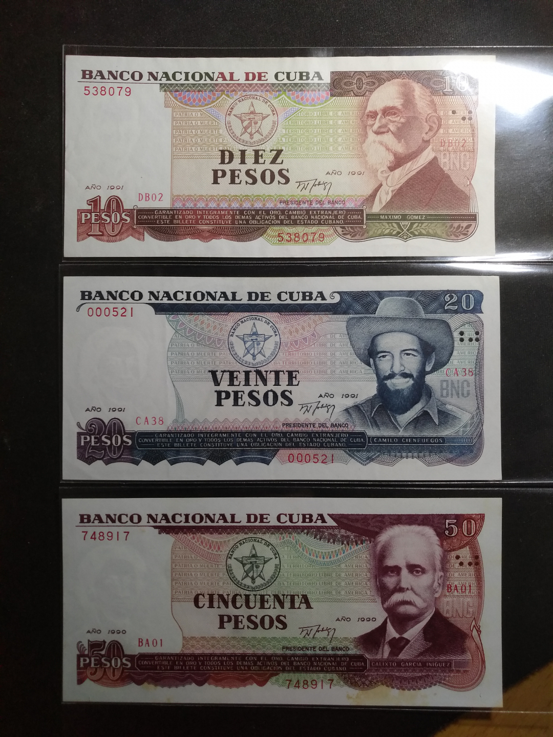 【鲸贝乐淘】千字文·第余号拍卖·上海钱币博览会专场 【中国代印】1990-1991年古巴10-50比索，AUNC ，10.20有小折痕，50比索有黄斑，50比索为错版，人名字母N上满未加~图标