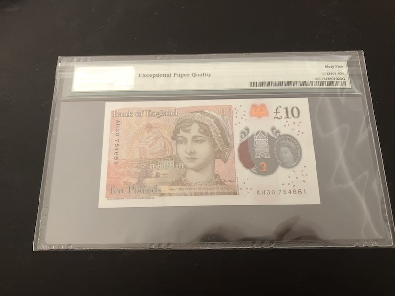 收藏联盟第八十九期拍卖 2016年英国10镑塑料钞 首发标签 PMG65E