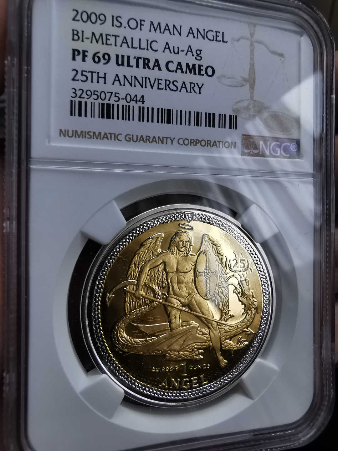 凡希社世界钱币微拍卖第九十一期 2009马恩岛天使斩龙纪念1盎司纯金镶嵌币NGC-69UC