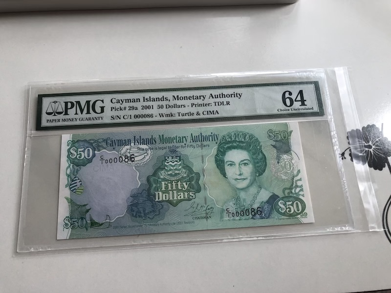 收藏联盟第九十期拍卖 2001年开曼群岛50元 PMG64