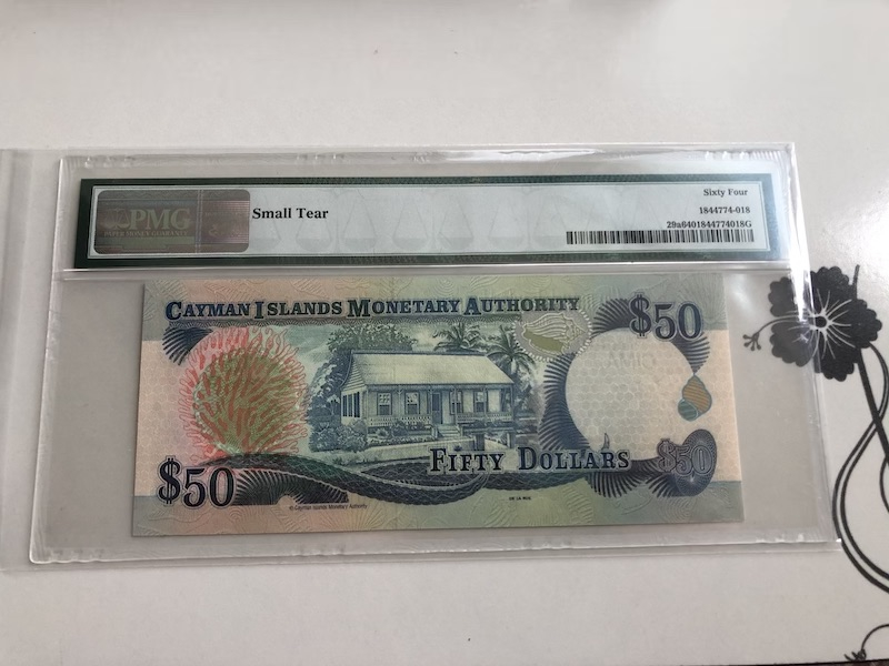 收藏联盟第九十期拍卖 2001年开曼群岛50元 PMG64