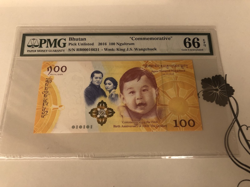 收藏联盟第九十一期拍卖 2016年不丹100努尔特鲁姆 小王子诞生纪念钞 PMG66E S/N:RB00016631