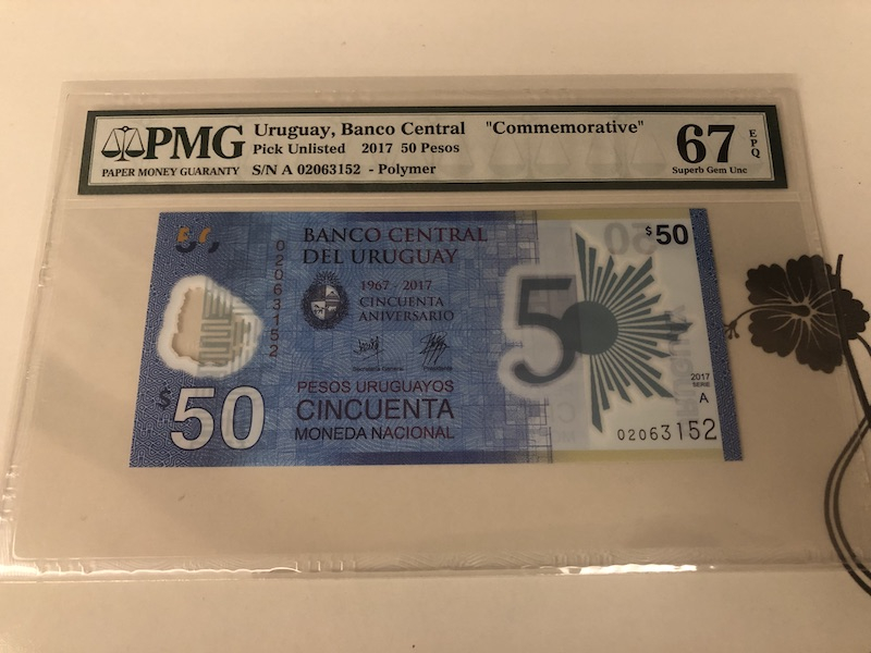 收藏联盟第九十一期拍卖 2017年乌拉圭50比索 PMG67E S/N:A02063152