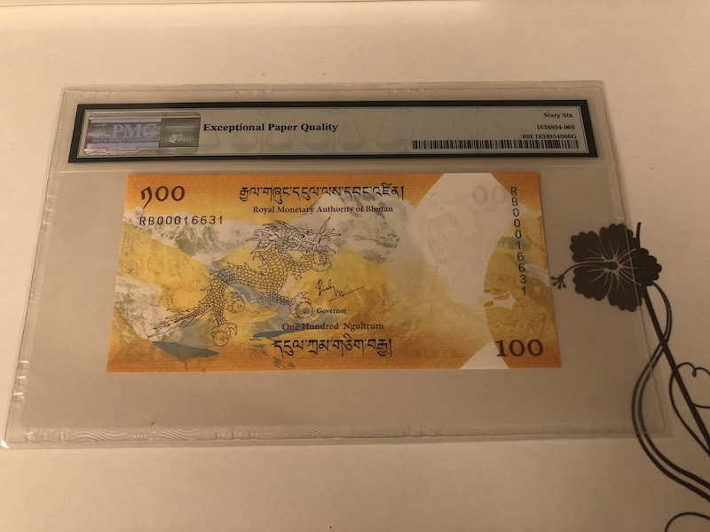 收藏联盟第九十一期拍卖 2016年不丹100努尔特鲁姆 小王子诞生纪念钞 PMG66E S/N:RB00016631