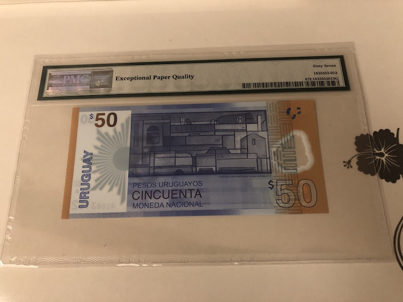收藏联盟第九十一期拍卖 2017年乌拉圭50比索 PMG67E S/N:A02063152