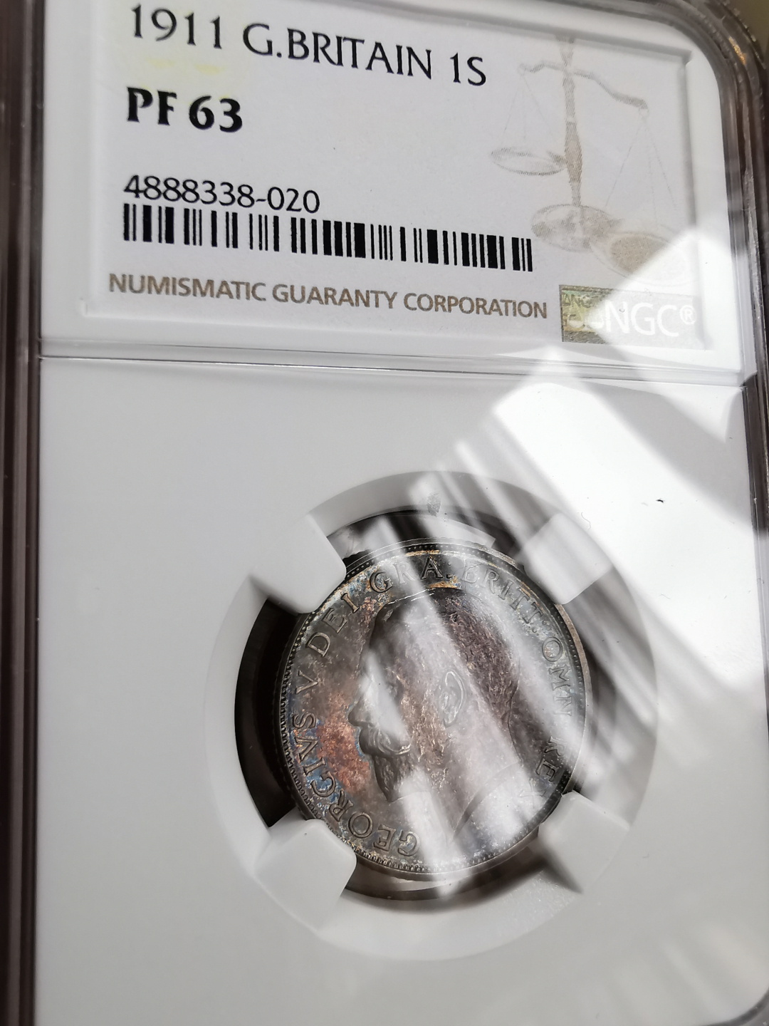 凡希社世界钱币微拍第九十三期 1911乔五精铸先令NGC-PF63五彩