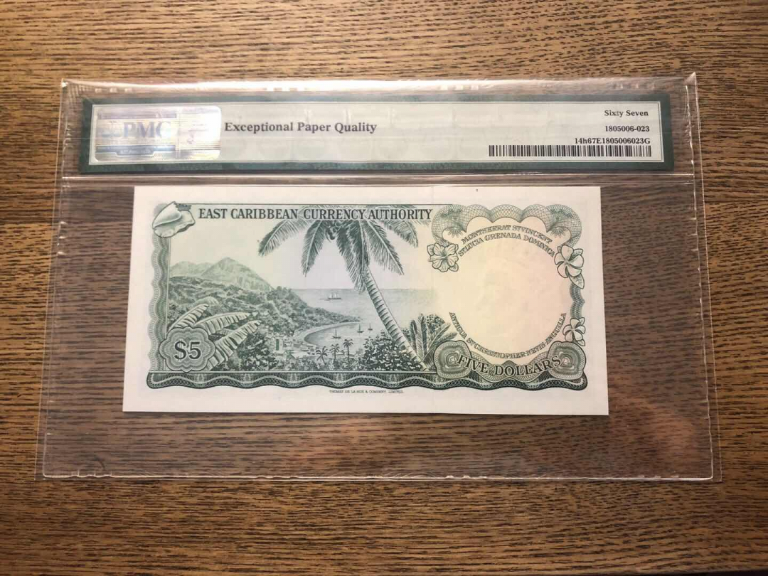 收藏联盟第九十三期拍卖 1965年东加勒比5元戎装女王 PMG67E