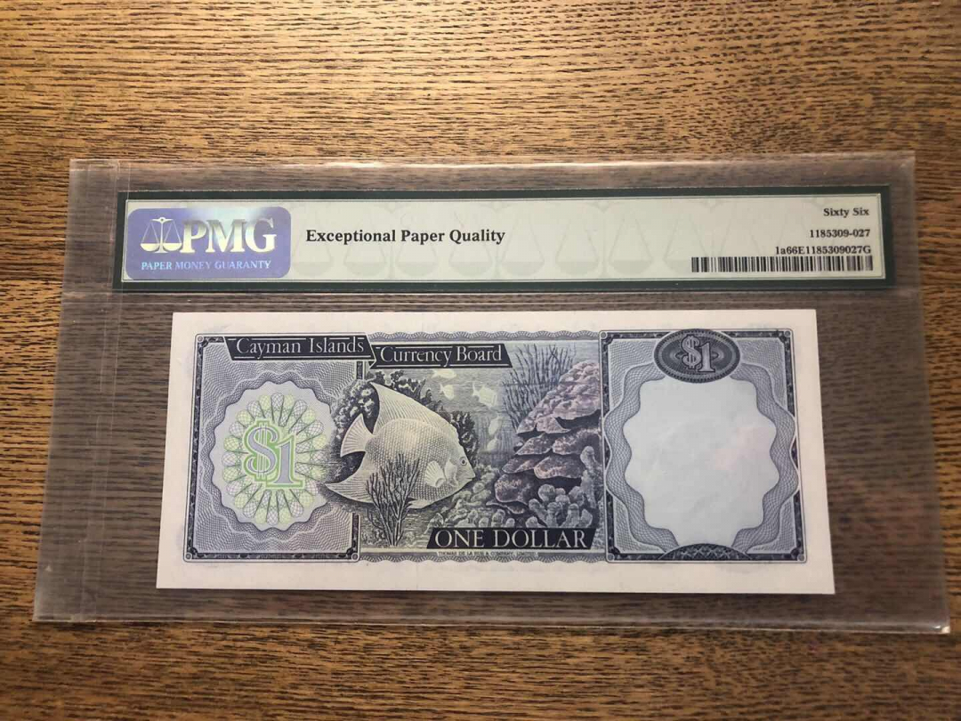 收藏联盟第九十三期拍卖 1971年开曼岛1元 首发冠无47尾88 PMG66E