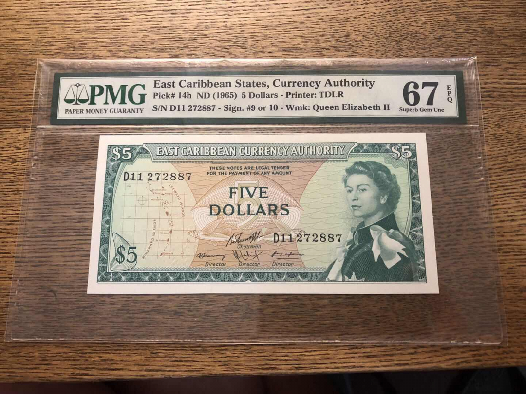 收藏联盟第九十三期拍卖 1965年东加勒比5元戎装女王 PMG67E