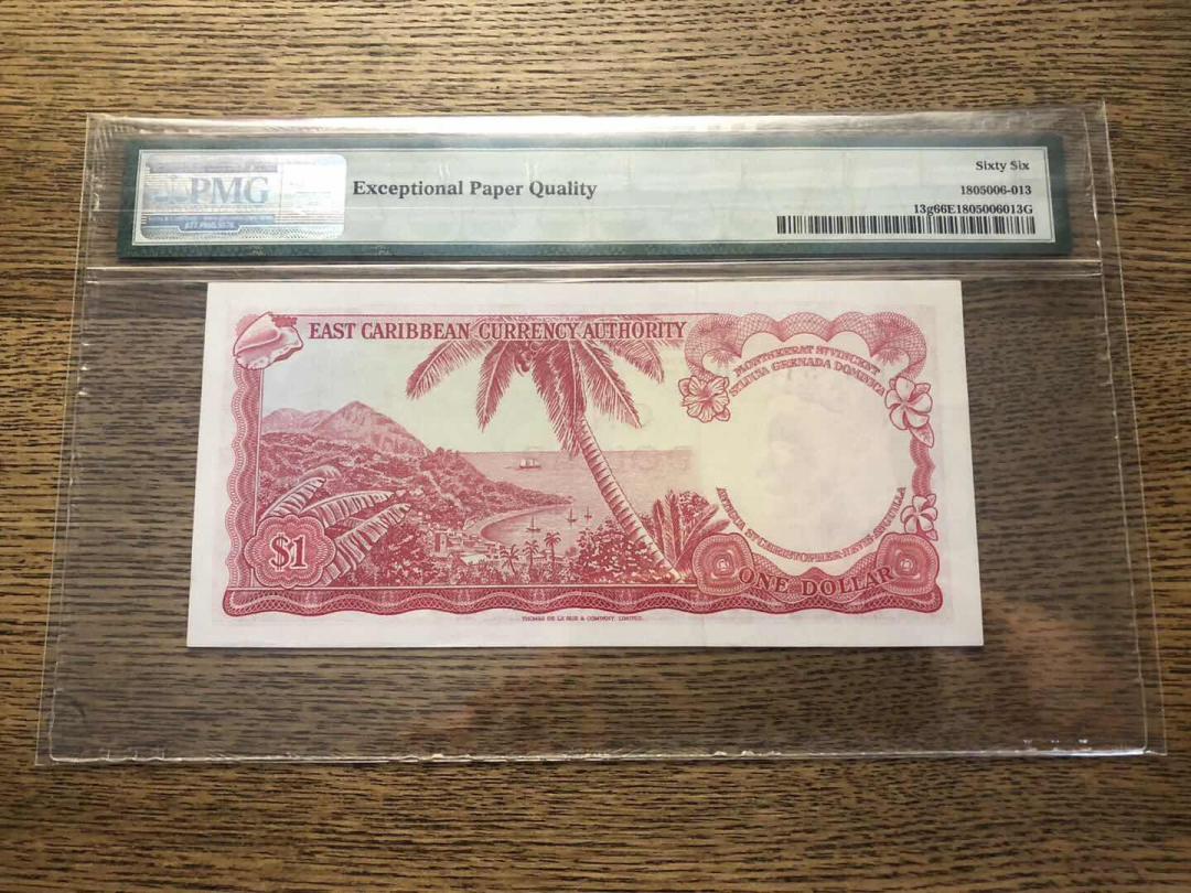 收藏联盟第九十三期拍卖 1965年东加勒比1元戎装女王 PMG66E