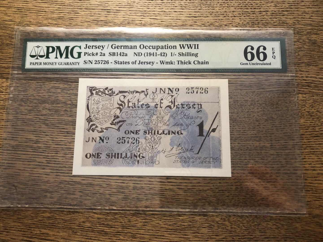 收藏联盟第九十三期拍卖 1941-42年泽西岛 二战德占区1先令 PMG66E