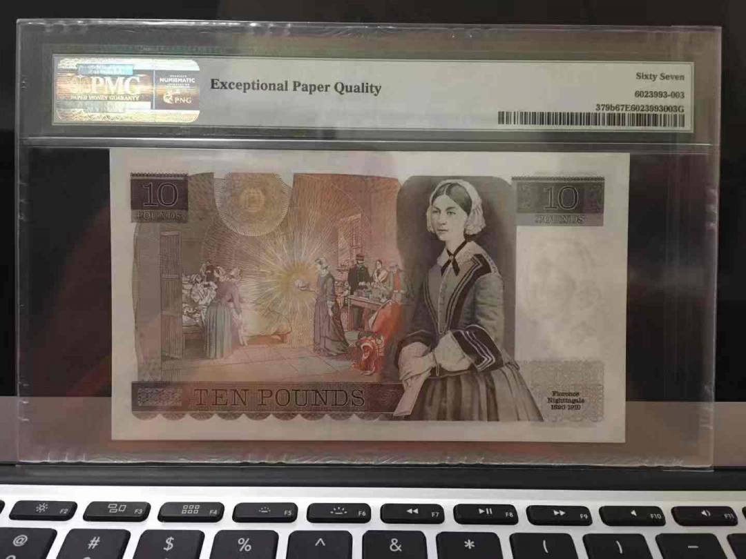 收藏联盟第九十三期拍卖 英国D序列10镑 南丁格尔 PMG67E